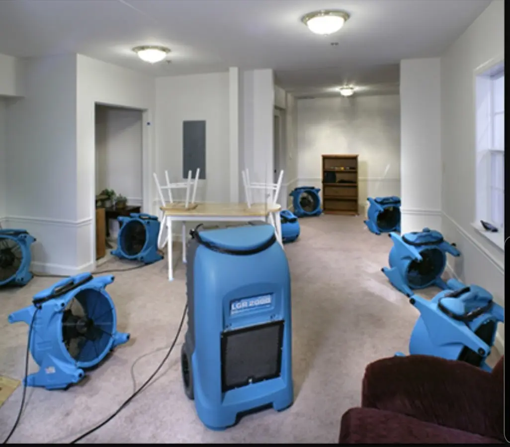 Air movers and dehumidifier setup for Water Extraction & Removal in Wyoming